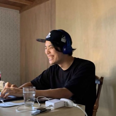 Yuuki, Anime Sensei — mid-lesson at his desk in Tokyo